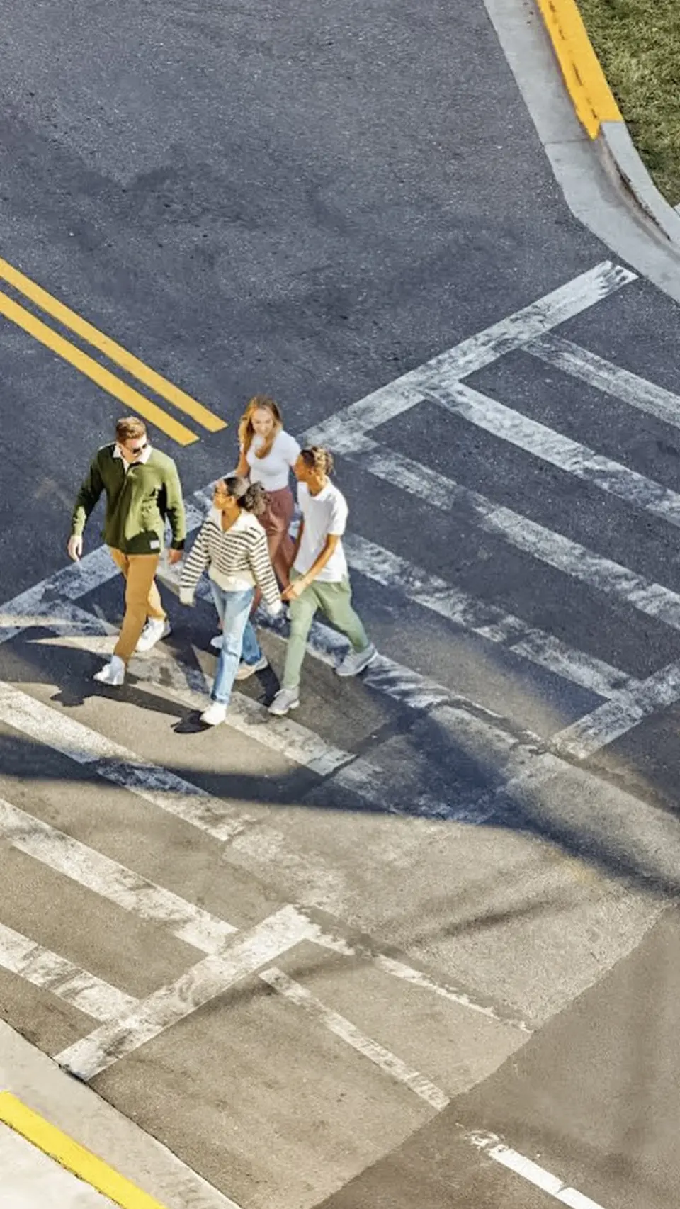 student crossing the street