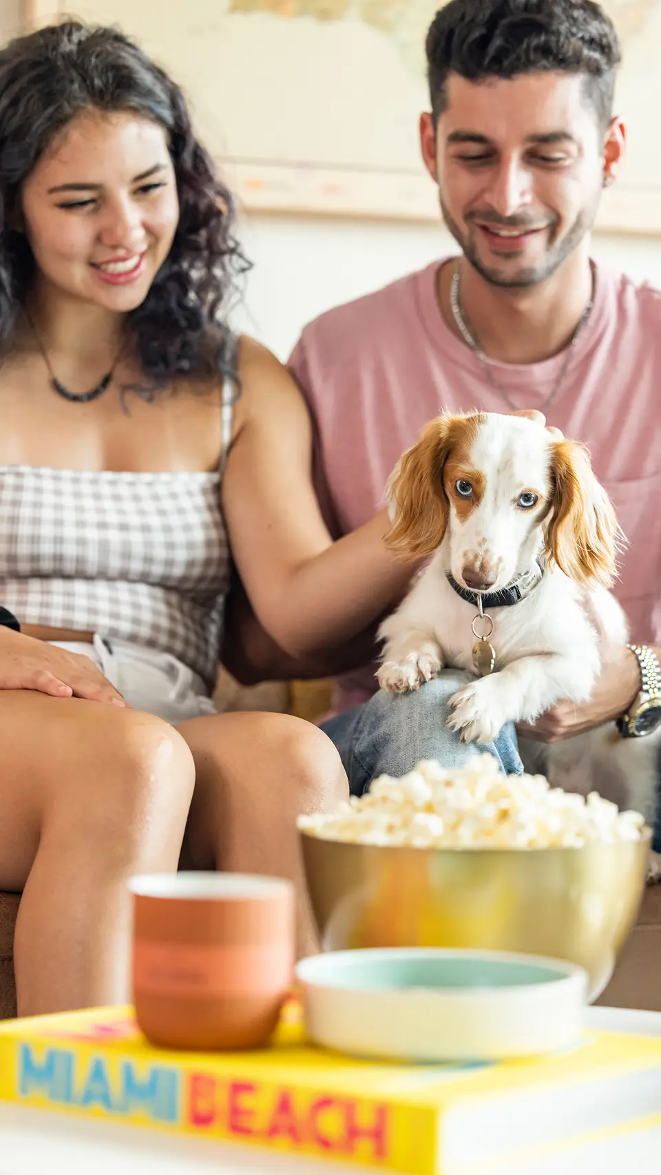 young couple and dog